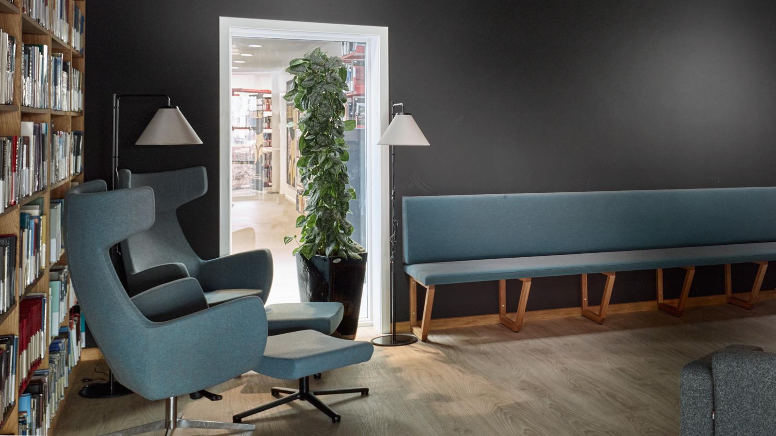 Armchairs and sofa in room Dewey